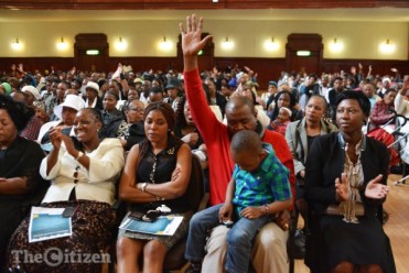 Bereaved families who lost loved ones in the Nigerian SCOAN church building collapse at a mass memorial service held at the Johannesburg City Hall, 20 November 2014. Picture: Valentina Nicol